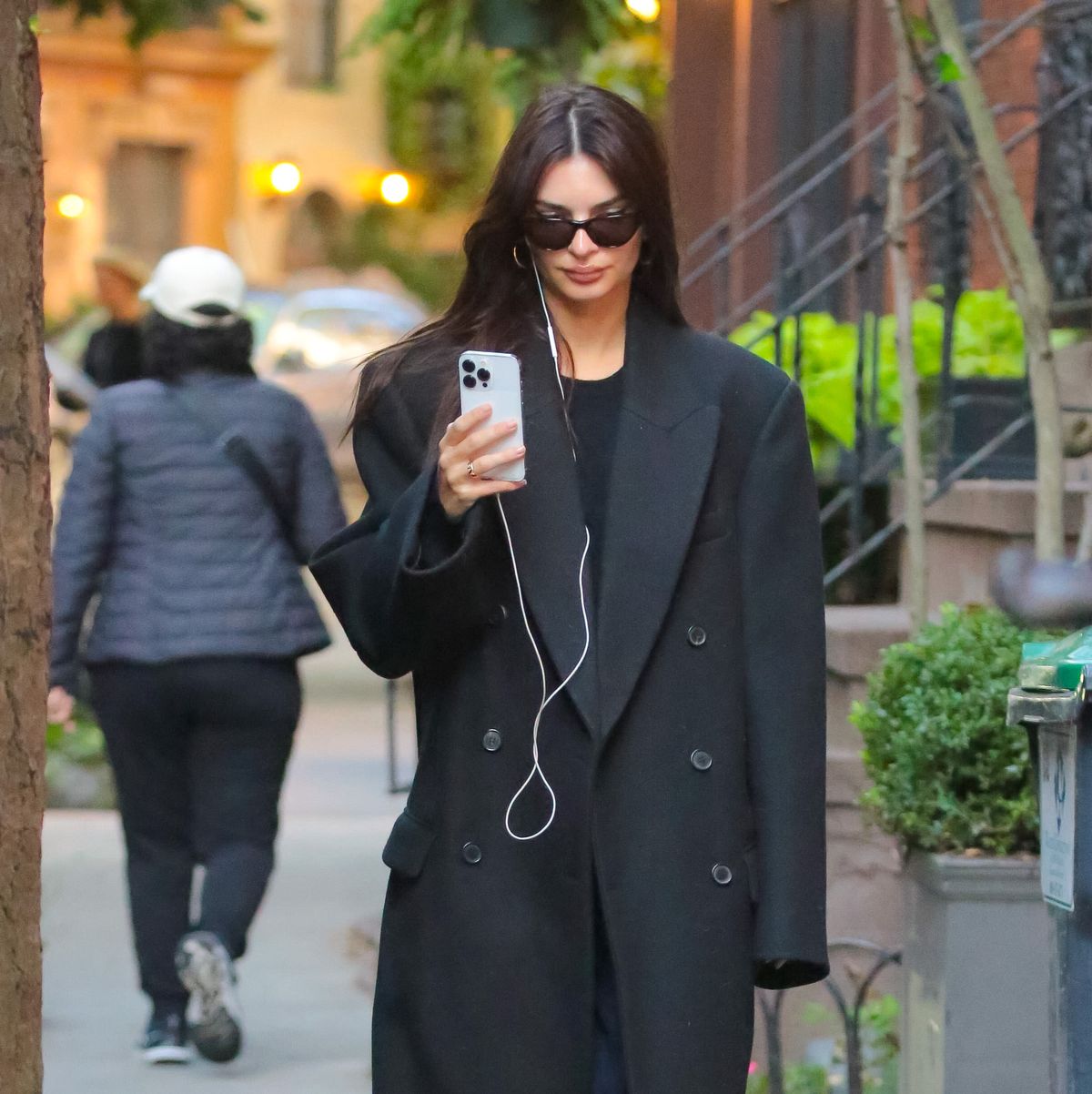 Emily Ratajkowski wears oversized tailored coat in NYC