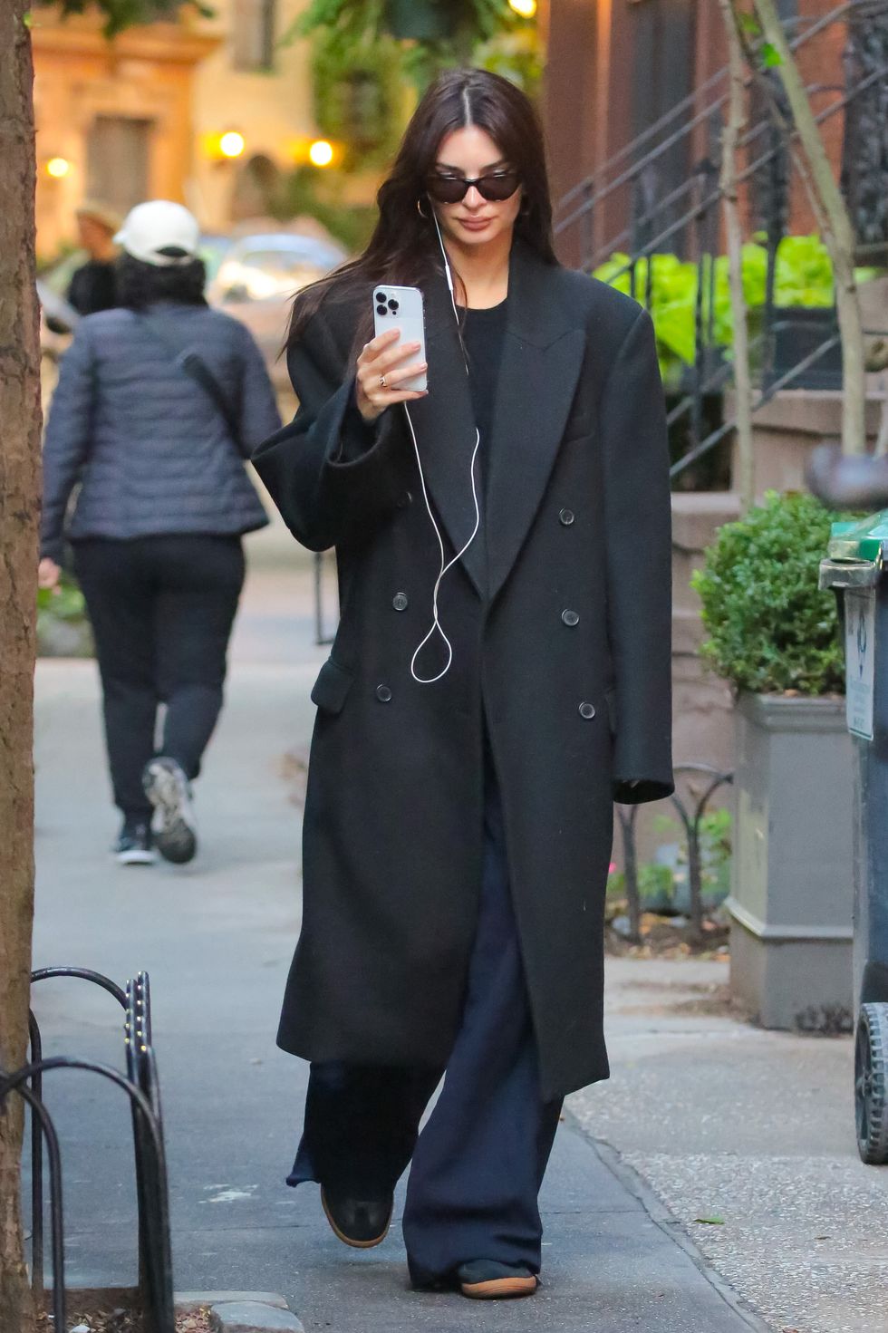Emily Ratajkowski wears oversized tailored coat in NYC