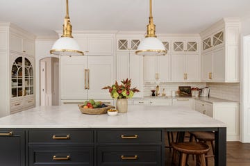 kitchen with black and white cabinets