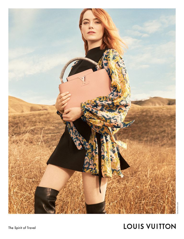 poster advertising Louis Vuitton handbag with Emma Stone actress in paper  magazine from 2019, advertisement, creative advert Stock Photo - Alamy