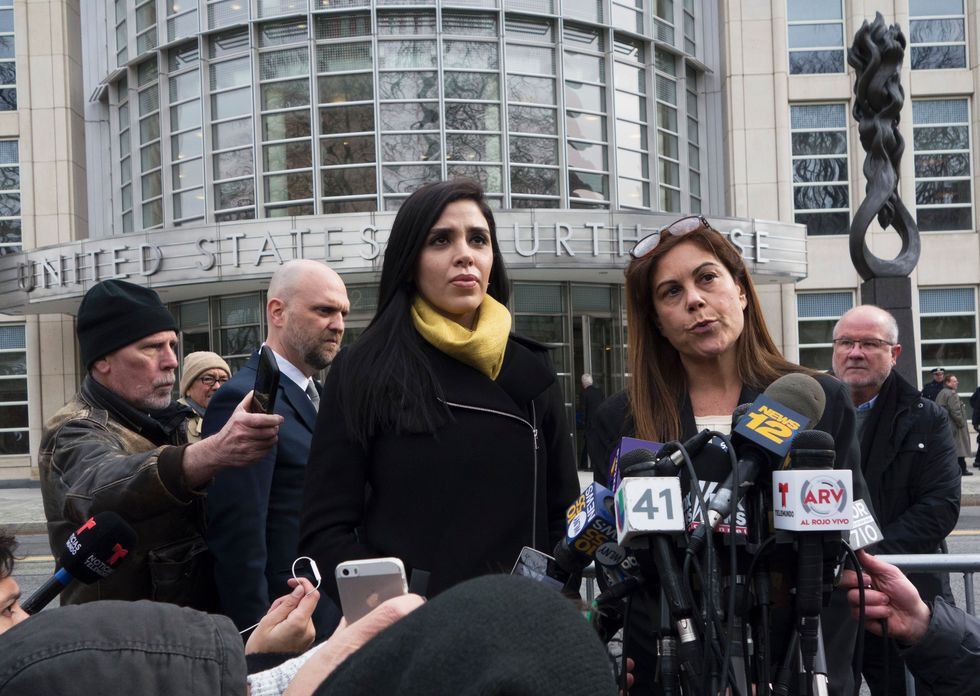 emma coronel aispuro listens as attorney michelle gelernt answers questions from reporters outside the us federal courthouse in brooklyn after a hearing in the case of joaquin el chapo guzman