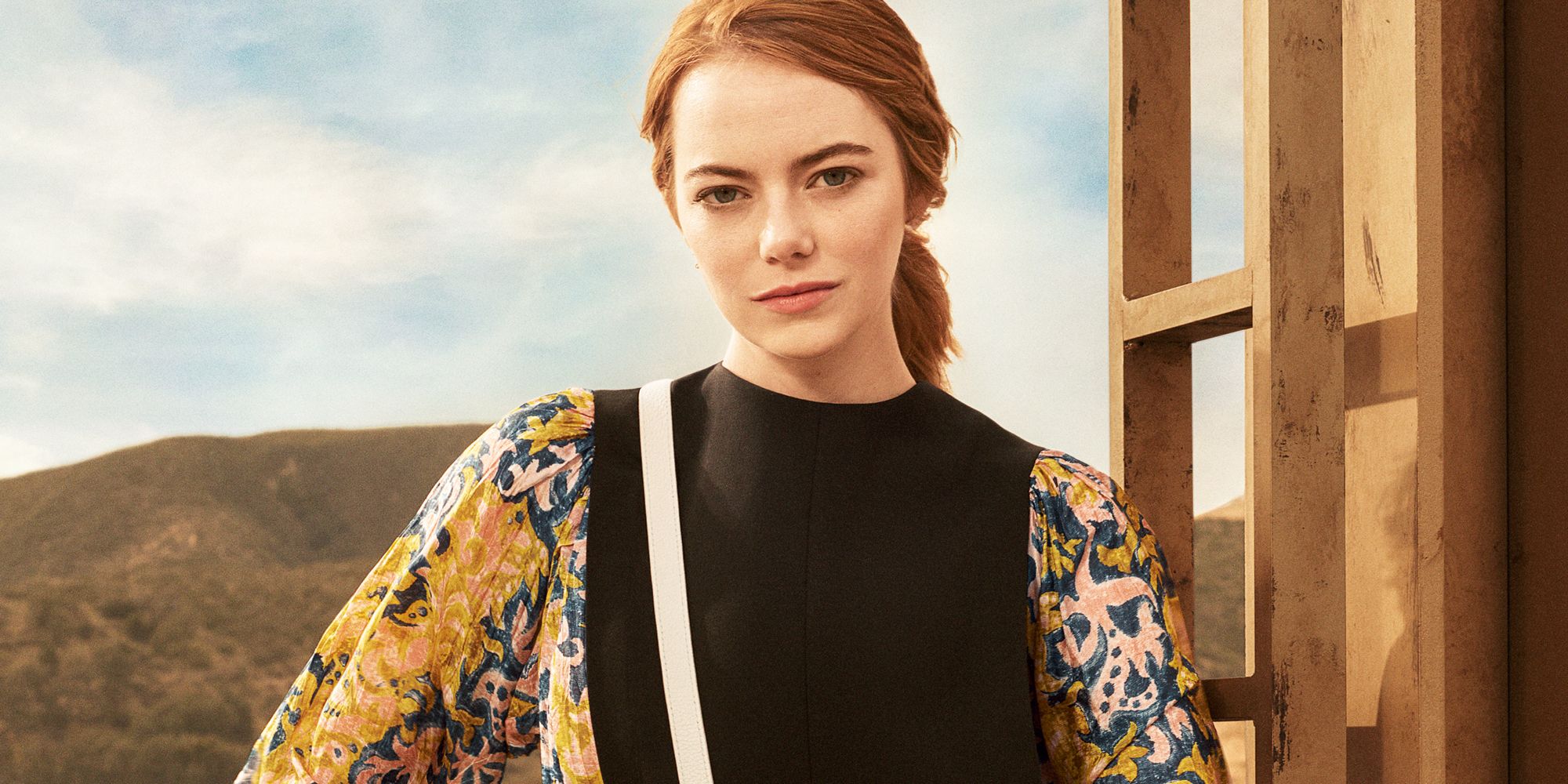 poster advertising Louis Vuitton handbag with Emma Stone actress in paper  magazine from 2019, advertisement, creative advert Stock Photo - Alamy