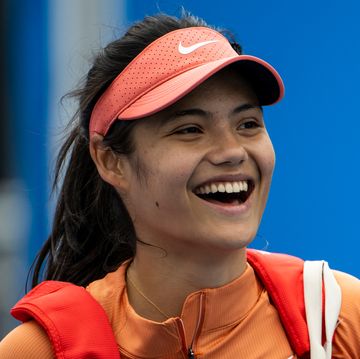 emma raducanu laughing during a practice session for the australian open