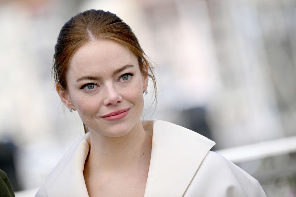 Emma Stone looks unreal in black and white plunging blazer dress in Cannes