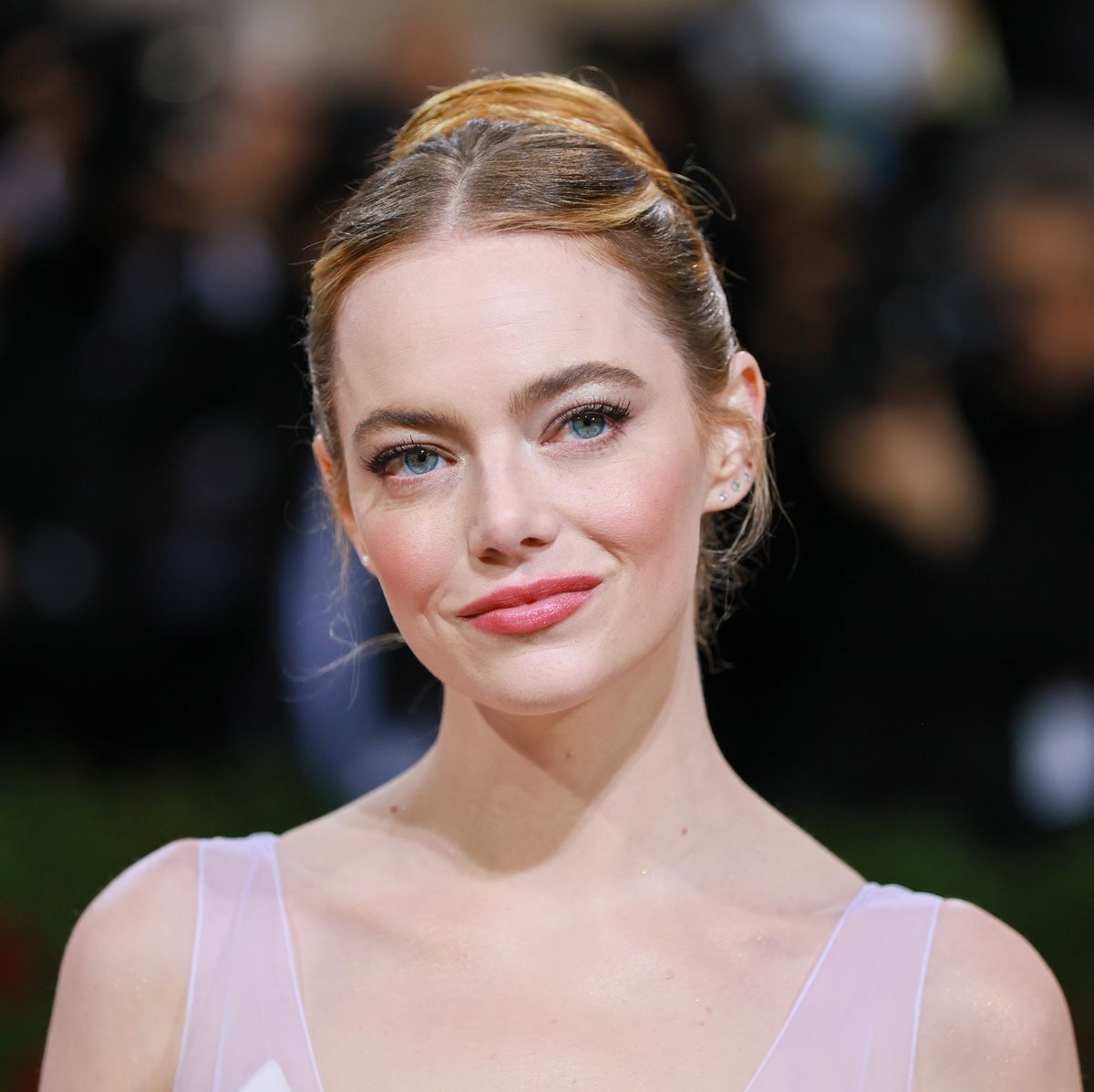 Emma Stone's gorgeous cropped suit is giving us some unbelievable