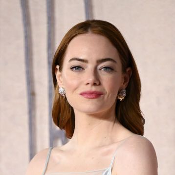 Emma Stone Wears Sheer Embroidered Dress to Screening of 'Poor Things