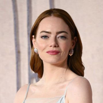 Emma Stone Wears Sheer Embroidered Dress to Screening of 'Poor Things'