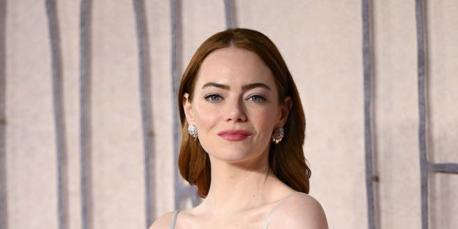 Emma Stone Wears Sheer Embroidered Dress to Screening of ‘Poor Things’