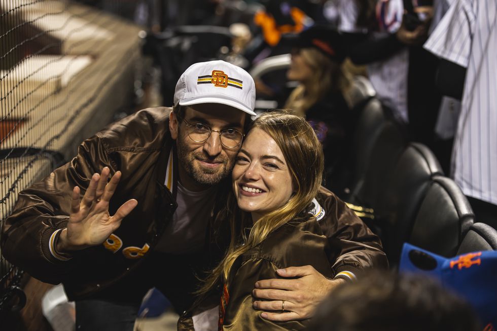 new york, ny october 7 actress emma stone and her husband dave mccary pose for photo as the san diego padres face against the new york mets in game one of the wild card series at citi field on october 7, 2022 in new york, newyork photo by matt thomassan diego padresgetty images