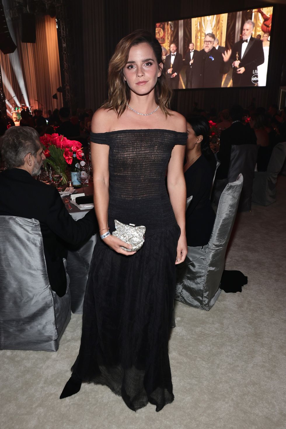 Emma Watson Wears Sheer Black Dress for Rare Oscars Party Appearance