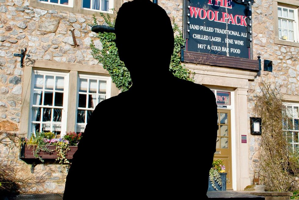 male silhouette in front of the woolpack pub in emmerdale