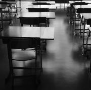 empty chairs and tables in classroom