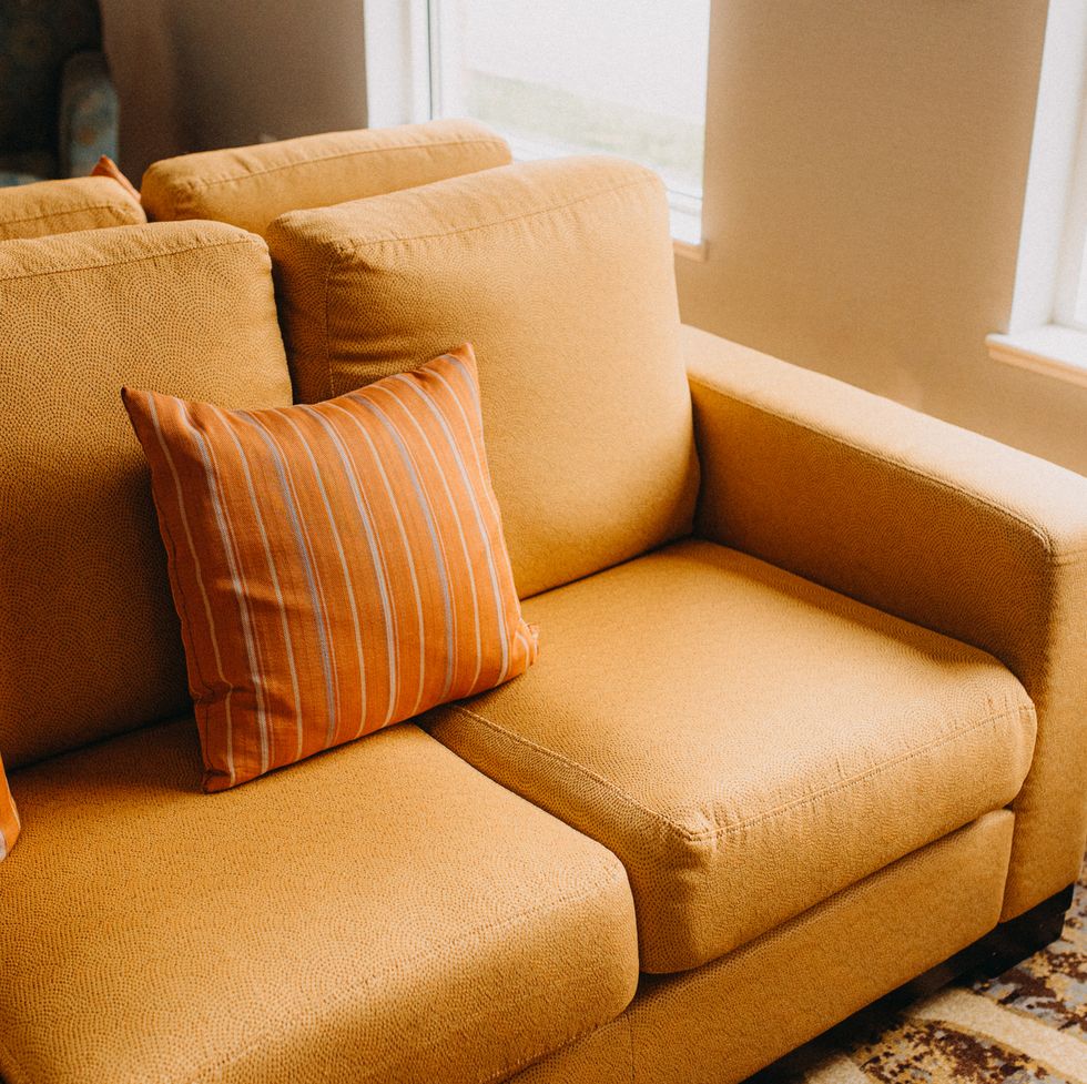 empty couch with cushions