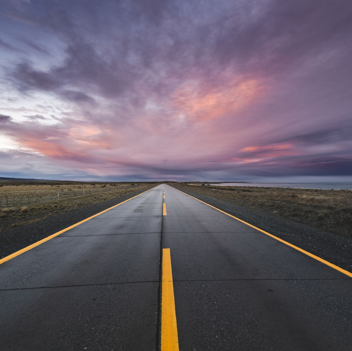 https://hips.hearstapps.com/hmg-prod/images/empty-paved-road-at-sunset-in-the-chilean-patagonia-royalty-free-image-1591901619.jpg?crop=0.669xw:1.00xh;0.147xw,0&resize=1200:*