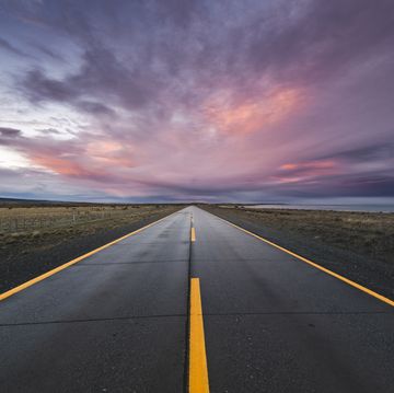 empty paved road at sunset in the chilean patagonia