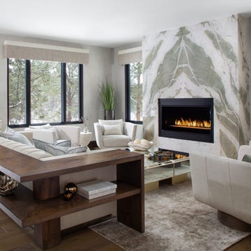 a living room with a fireplace