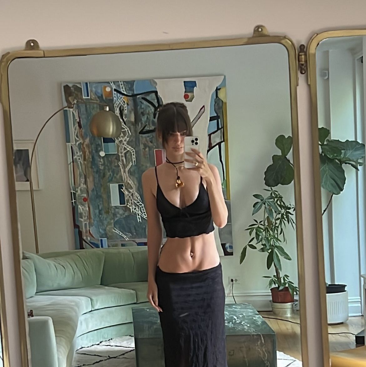 Emily Ratajkowski spotted in a black string bikini at the Sydney's