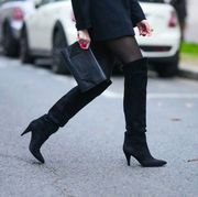 a woman wears black tights to illustrate a post about sheertex tights on sale 2022