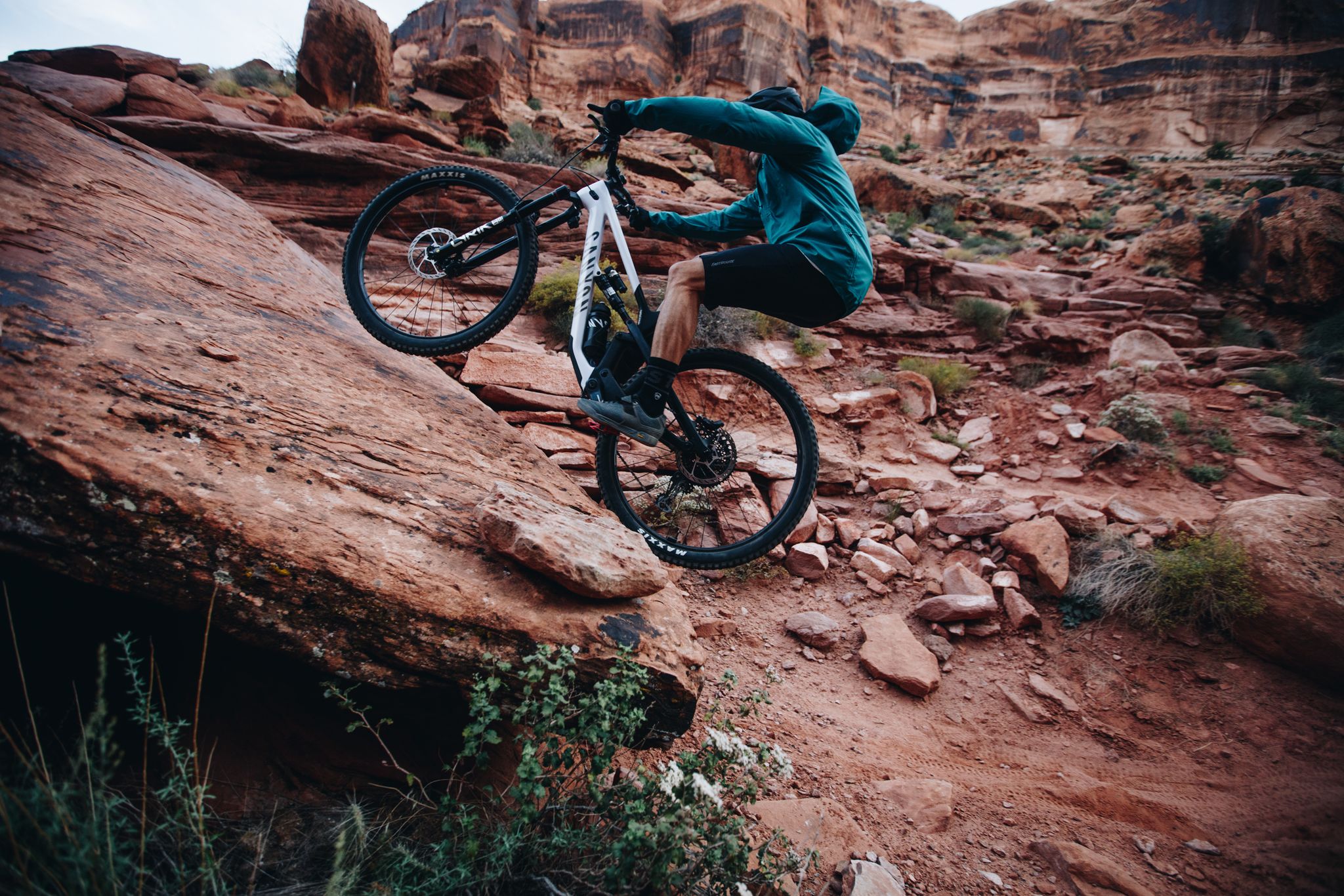 biking up boulders on whole enchilada bike trail in moab utah