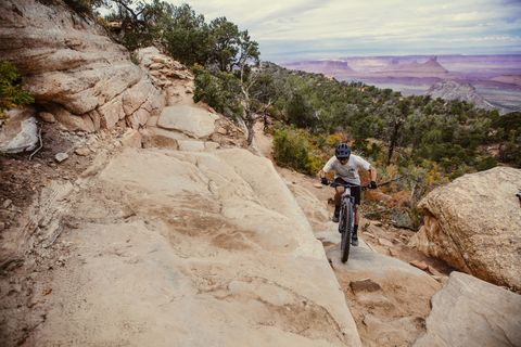 braydon bringhurst biking up the whole enchilada bike trail in moab utah