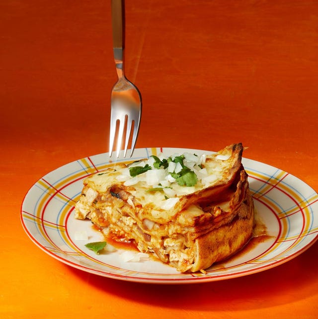 a slice of enchilada pie on a plate