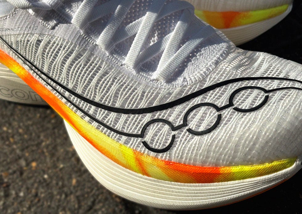 running shoe with bright accents and textured fabric