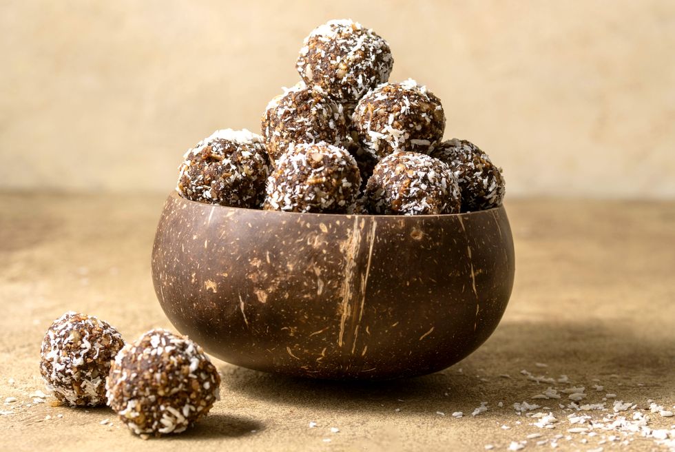 energy balls no cook energy protein, bites made from coconut flakes, oats, dried fruits and nuts