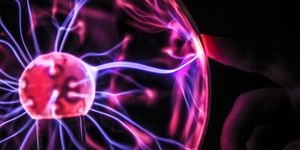 closeup of a plasma ball emitting an electric current