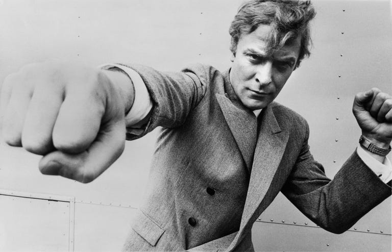 https://hips.hearstapps.com/hmg-prod/images/english-actor-michael-caine-throwing-a-punch-august-1965-news-photo-1620756077.?crop=0.860xw:1.00xh;0.107xw,0&resize=768:*