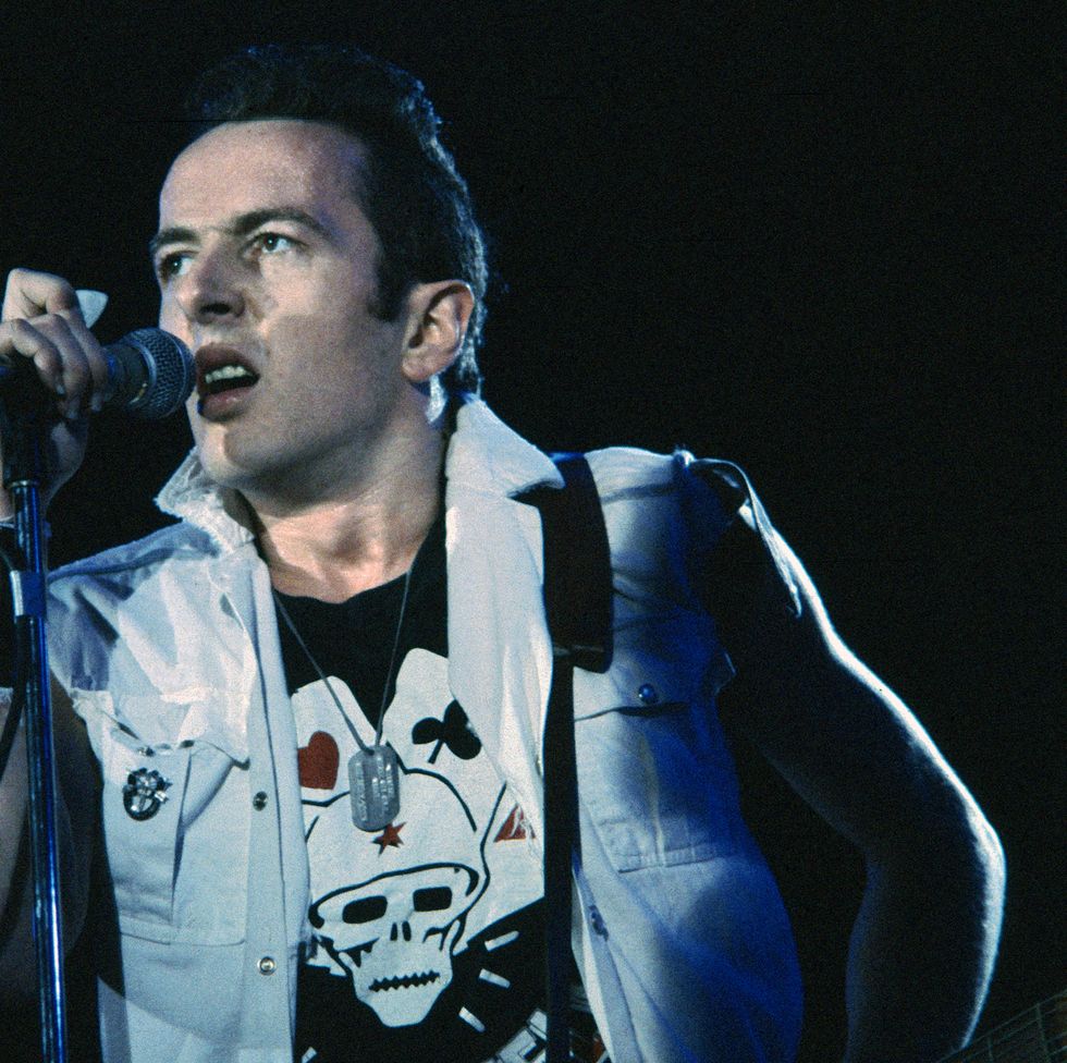 devore, california may 28 : english musician joe strummer of the clash, plays guitar as he performs onstage during the us festival at glen helen regional park, may 28, 1983 in devore, california. (photo by bob riha, jr./getty images)
