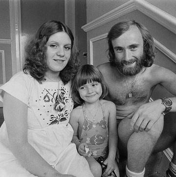 phil collins sitting to the right of his ex wife andrea bertorelli and their daughter