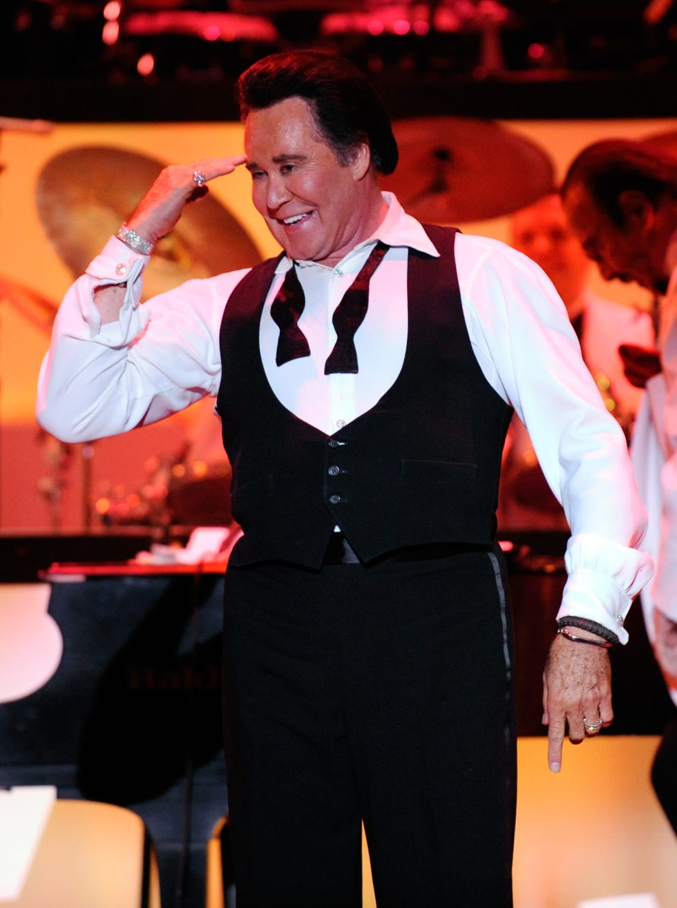 wayne newton performs on stage