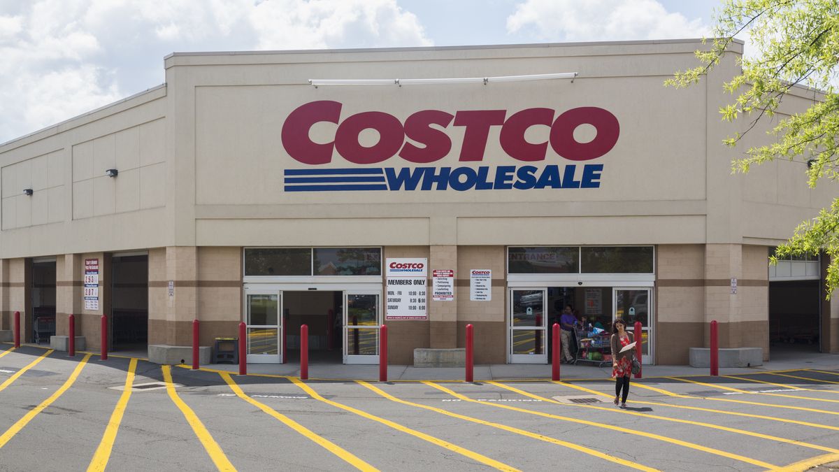 entrance to large costco warehouse superstore in manassas, virginia, usa