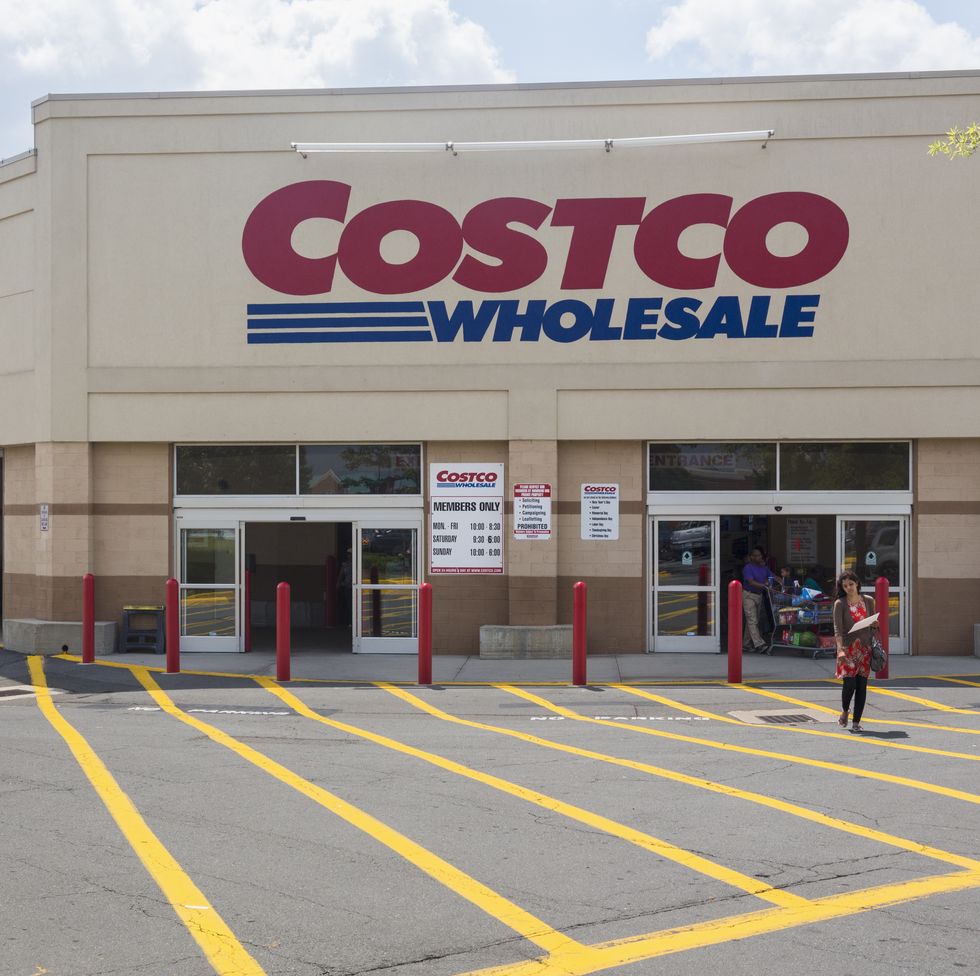 entrance to large costco warehouse superstore in manassas, virginia, usa