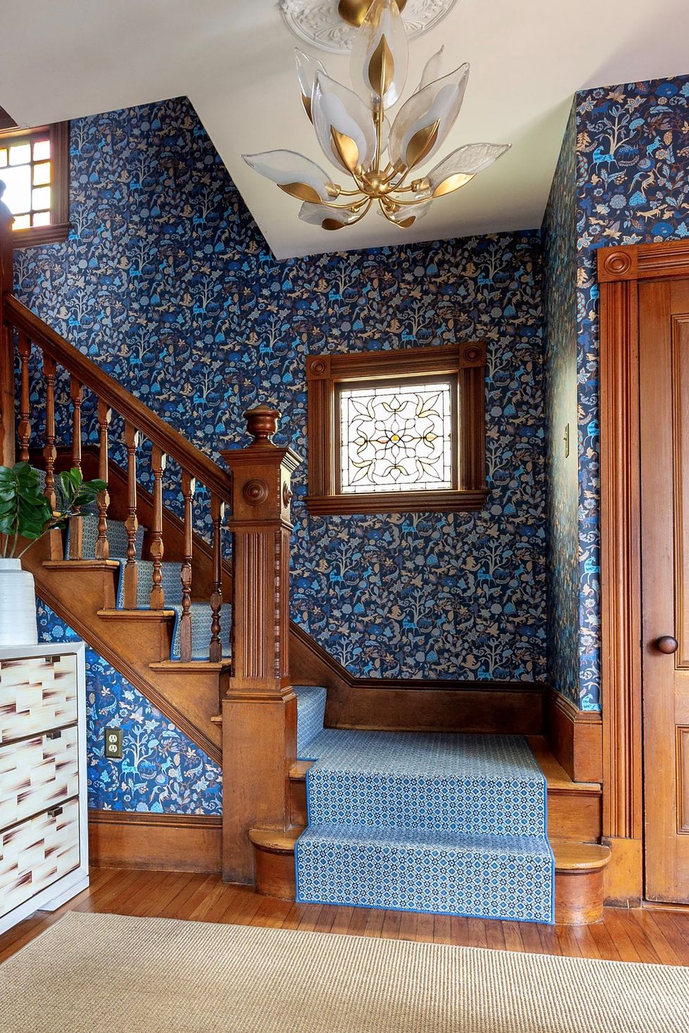 Entry using floral wallpaper