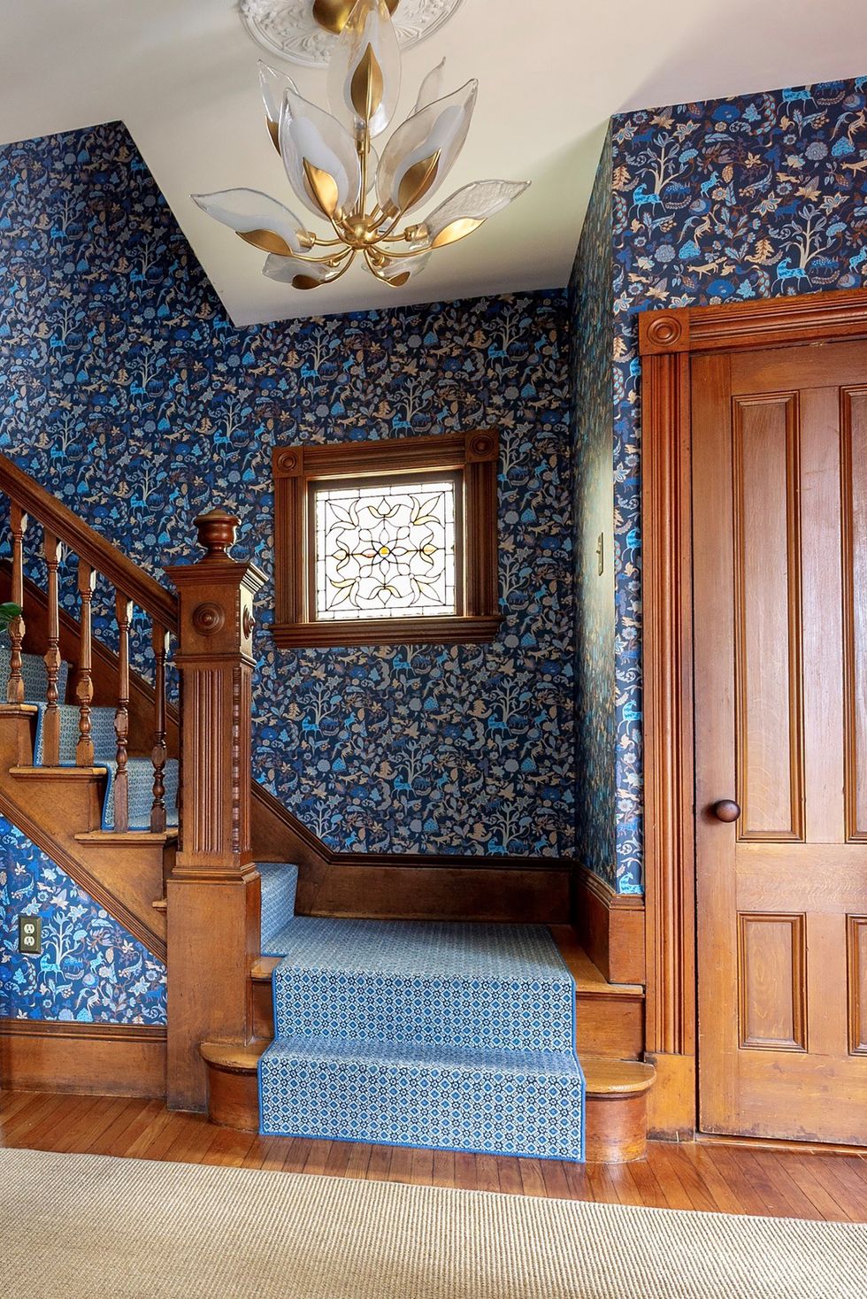 entry with floral wallpaper