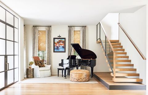 entryway with grand piano