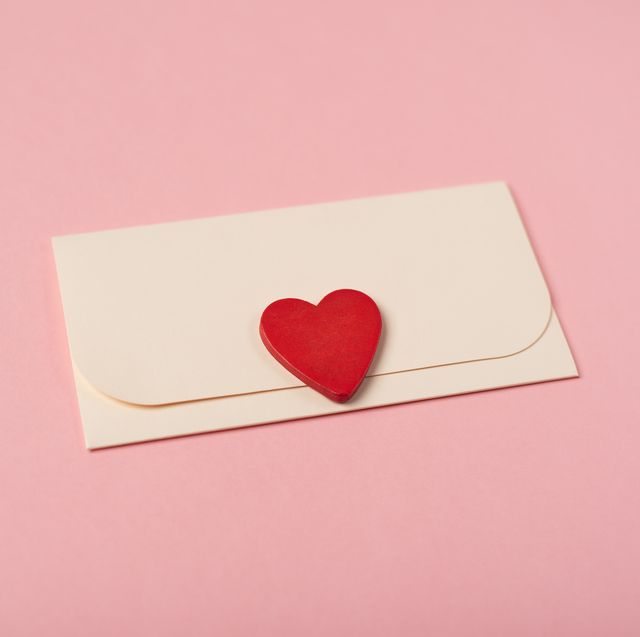 envelope and red heart on the rose background