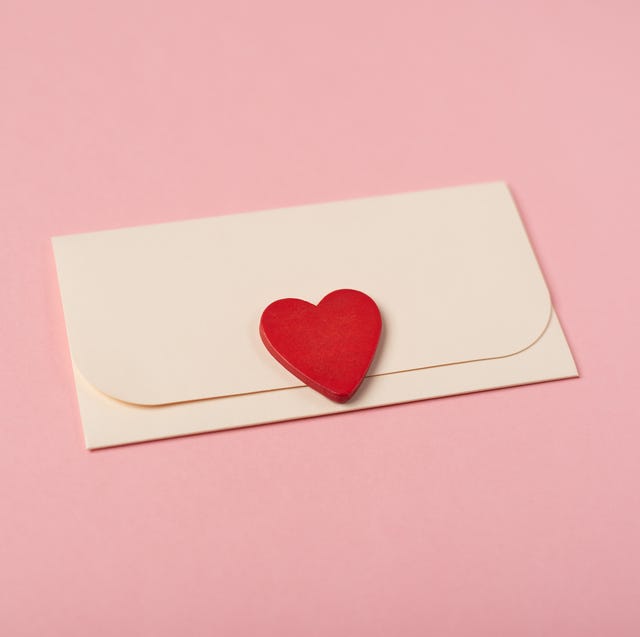 envelope and red heart on the rose background