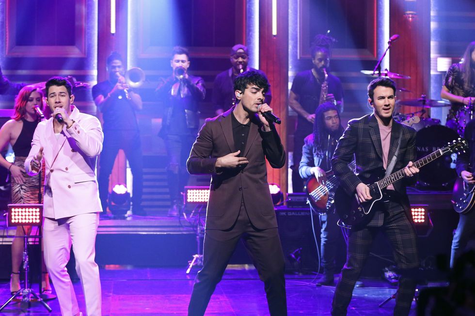 jonas brothers perform onstage