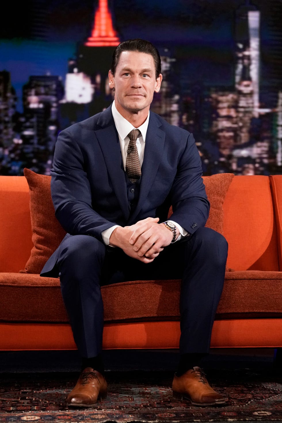 actor and former wwe star john cena sitting during an interview on the tonight show starring jimmy fallon season 8