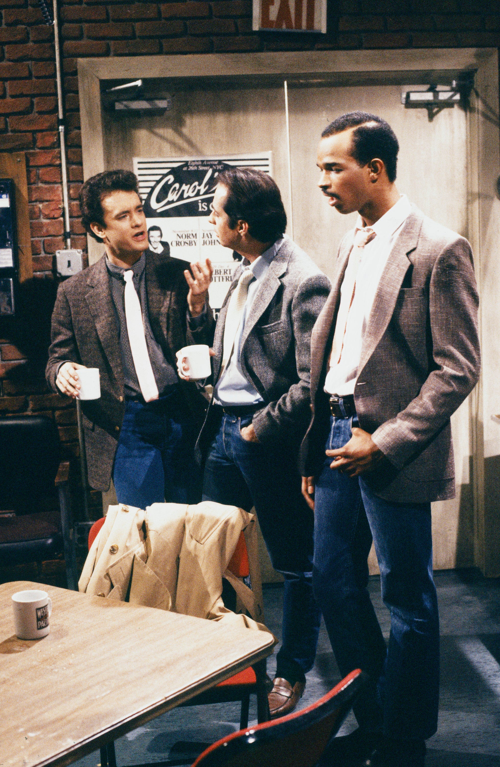 tom hanks, jon lovitz, and damon wayans perform in a skit for saturday night live