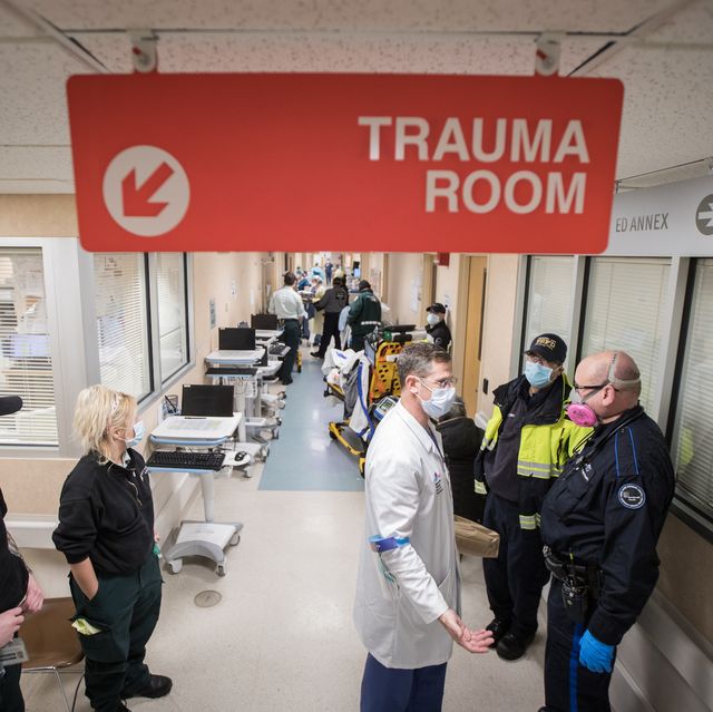 emergency department chief dr joshua kugler speaks with paramedics after they bring in a patient to mount sinai south nassau hopsital in oceanside, on april 13, 2020