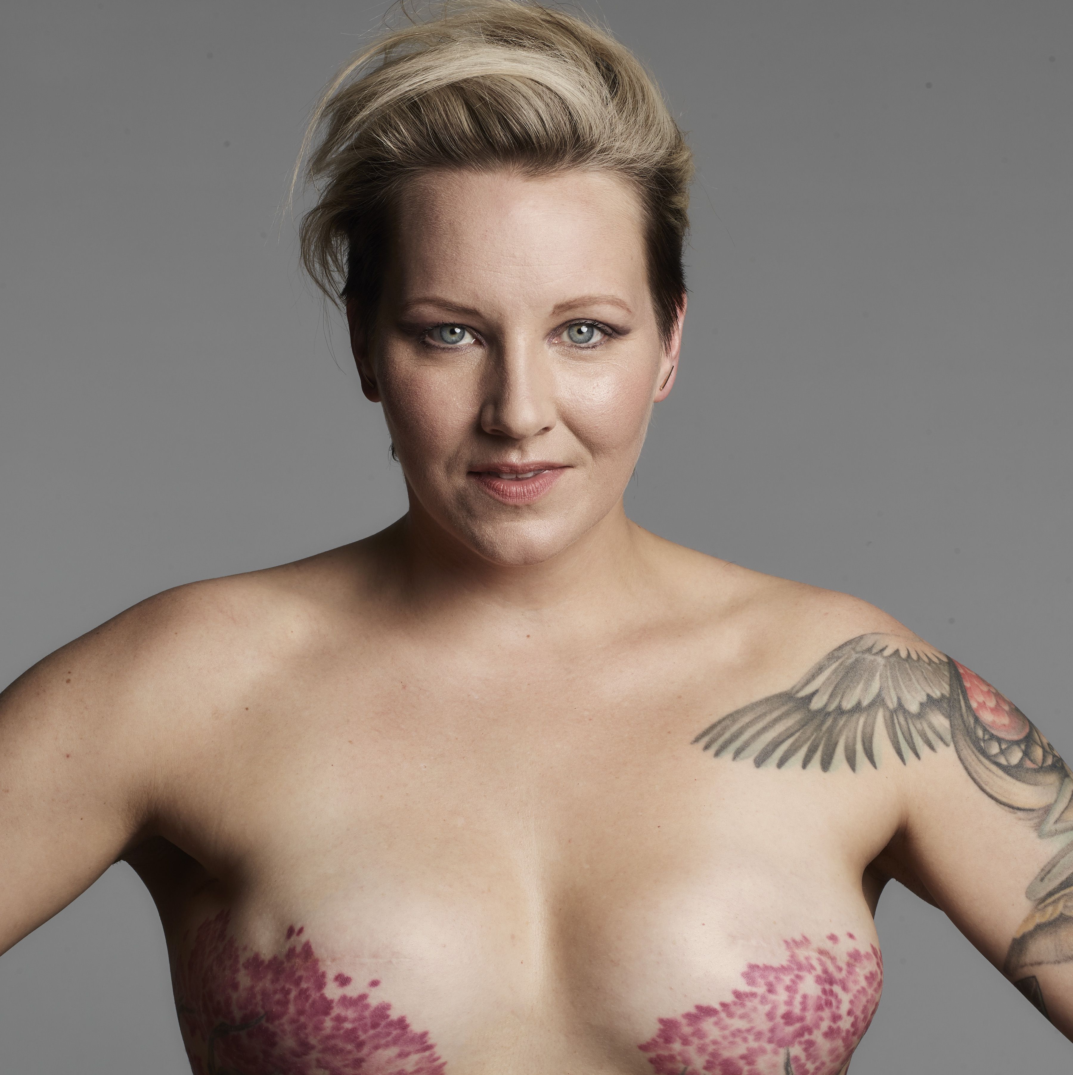 breast cancer tattoos on breast