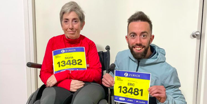 eric domingo roldan and his mum sylvia hold up their race numbers ahead of the barcelona marathon