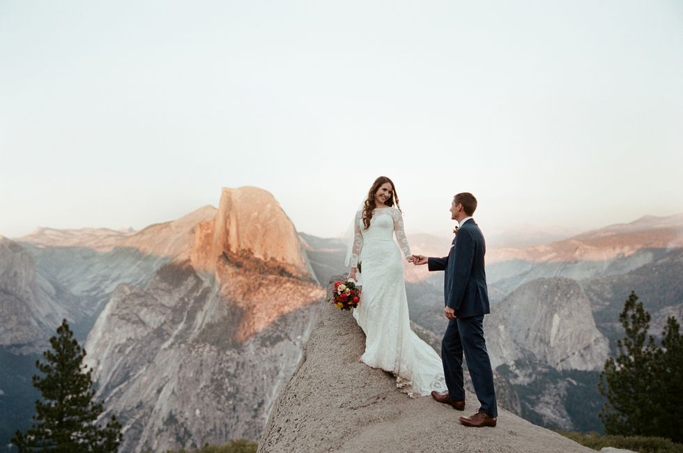 Photograph, Bride, Wedding dress, Dress, Gown, Wedding, Ceremony, Veil, Mountain, Sky, 