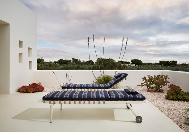 two sunbeds on a patio