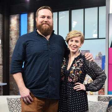 Erin Napier Releases New Book erin and ben napier smiling as they visit the set of people