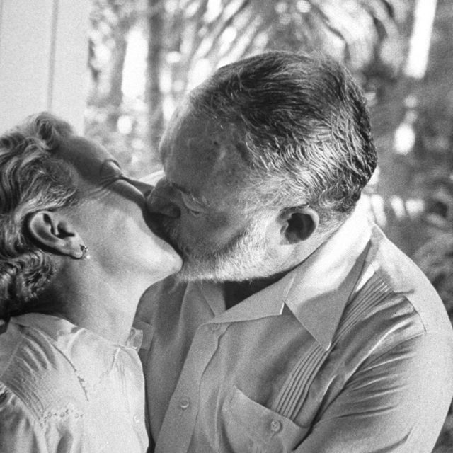 Ernest Hemingway kissing his wife Mary Welsh