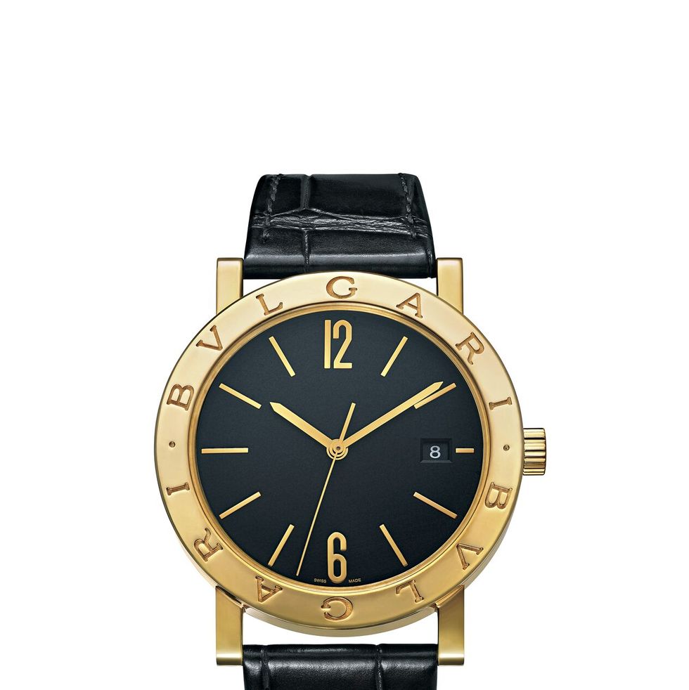 a gold and black watch